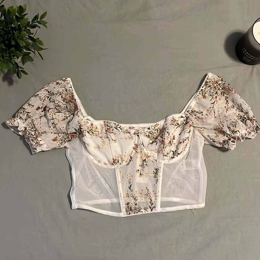 Francesca’s ivory mesh embroidered crop top.